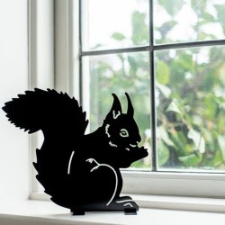 Silhouette Écureuil qui mange